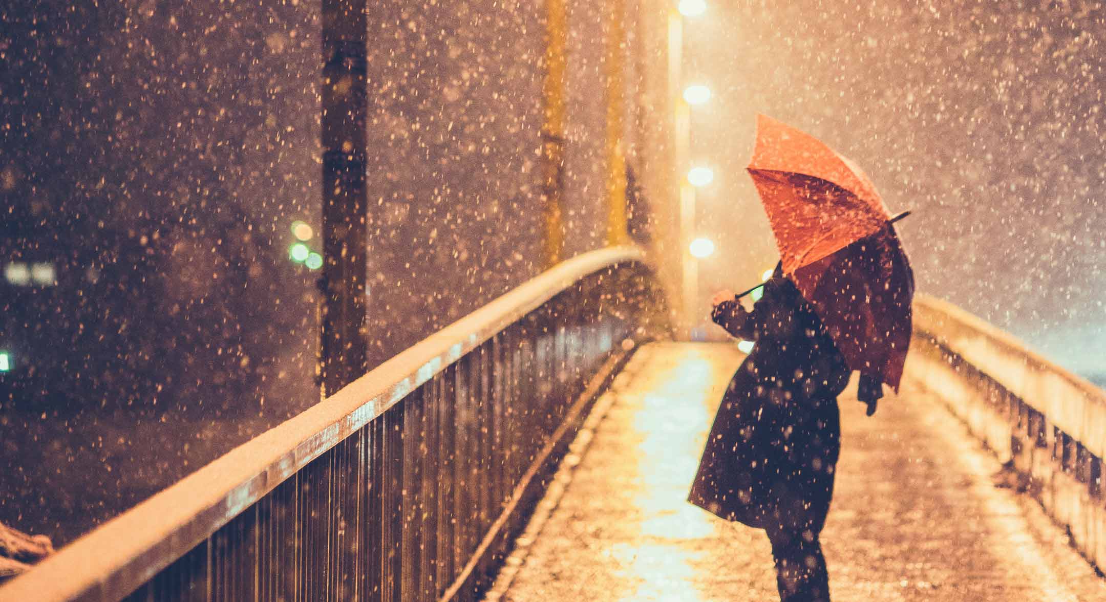 Person holding umbrella