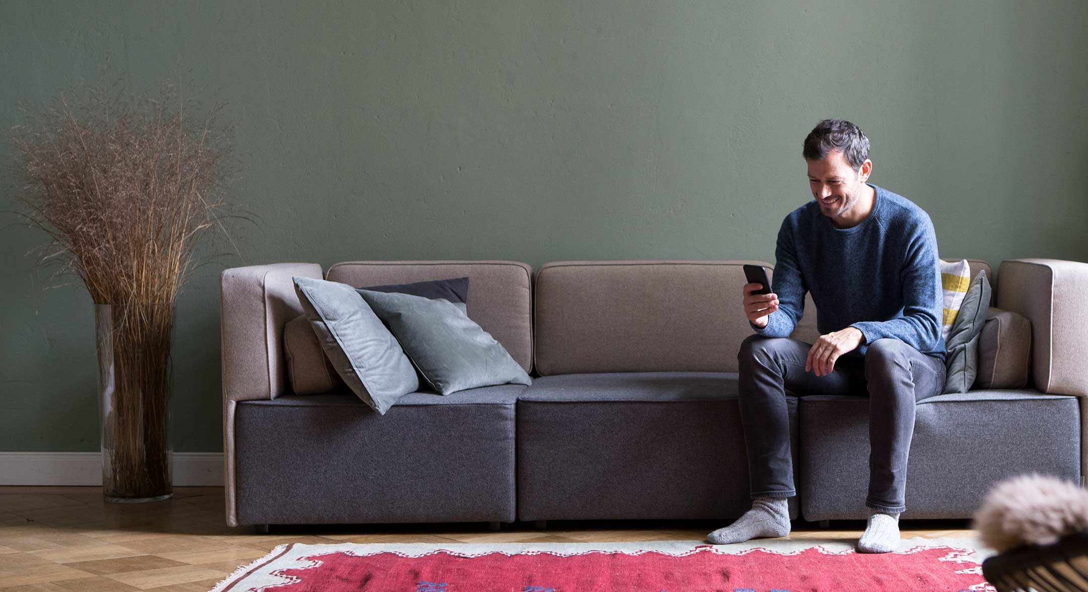 Man sitting on couch